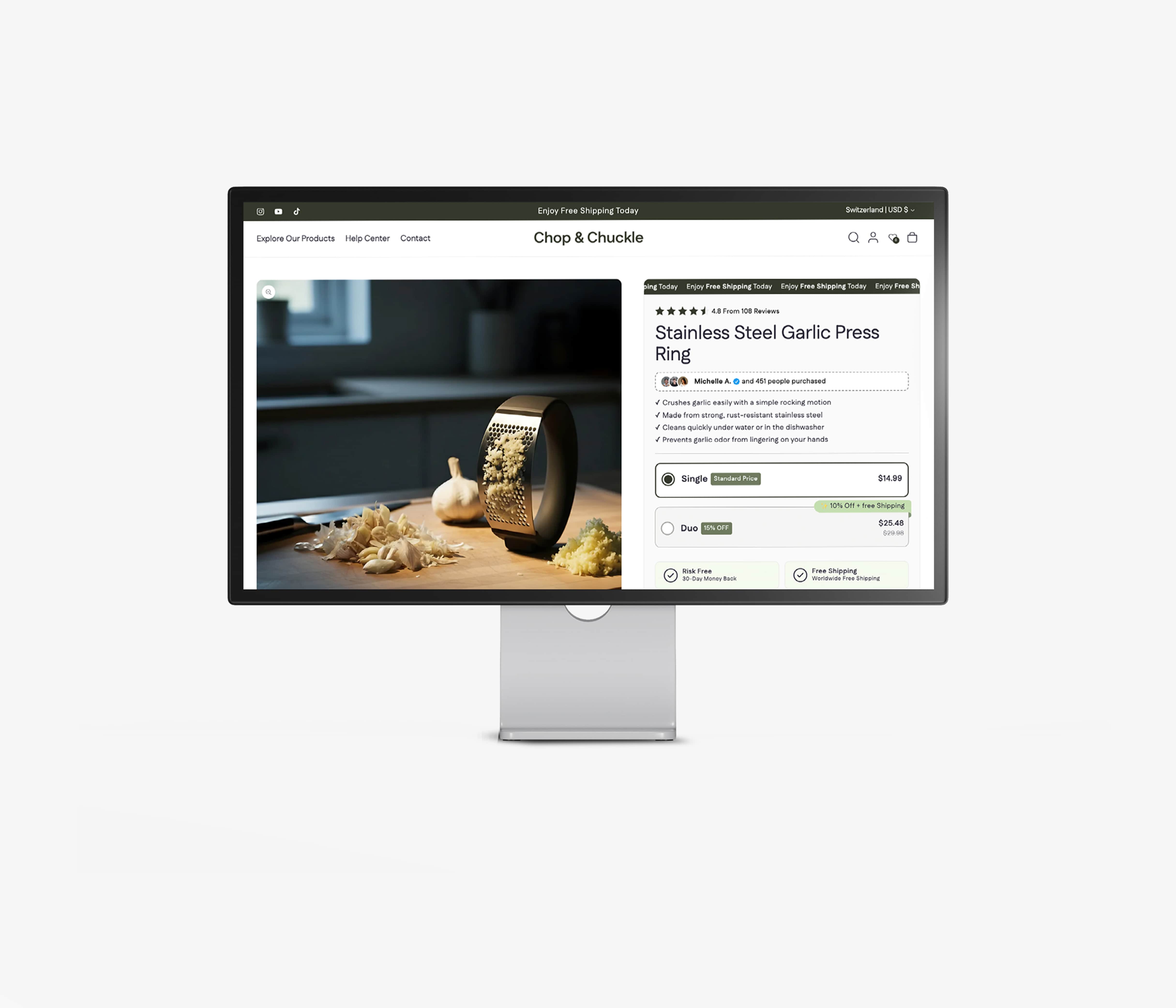 Computer monitor displaying a ready made shopify product page for a garlic press ring on a white background